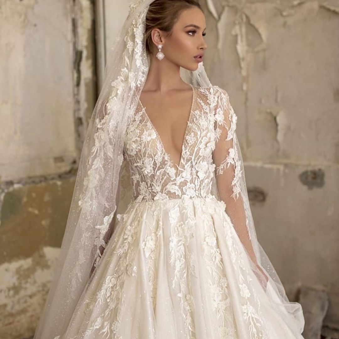 Elegant Deep V-neck Wedding Dress with Appliques, Lace, Ruffles, and Tulle