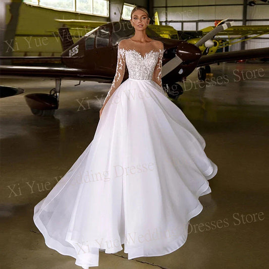 2025 Generous A Line Women's Wedding Dresses Charming Lace Appliques Long Sleeve Beach Gowns