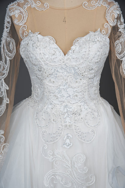 Elegant Long Sleeve Ball Gown Wedding Dress with Lace Appliques