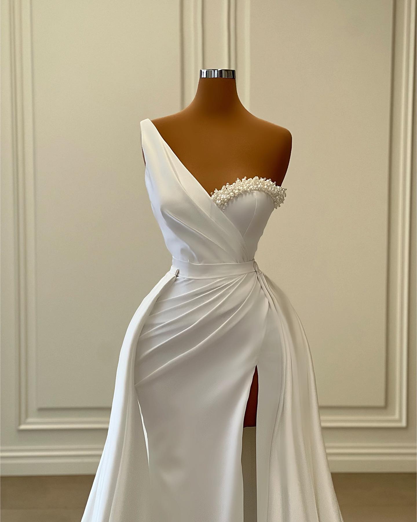 Elegant One Shoulder Satin Mermaid Wedding Dress with Slit Overskirt and Pearls