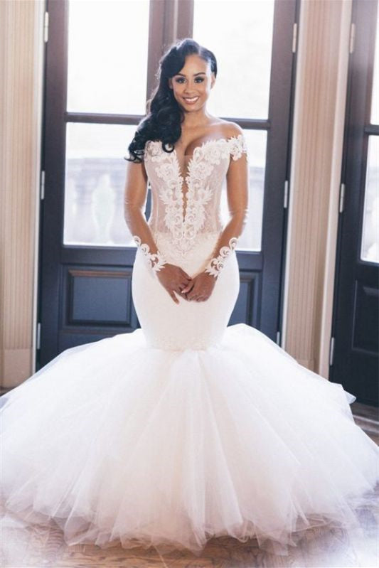 Stunning Tulle Mermaid Wedding Dress with Appliques and Long Sleeves